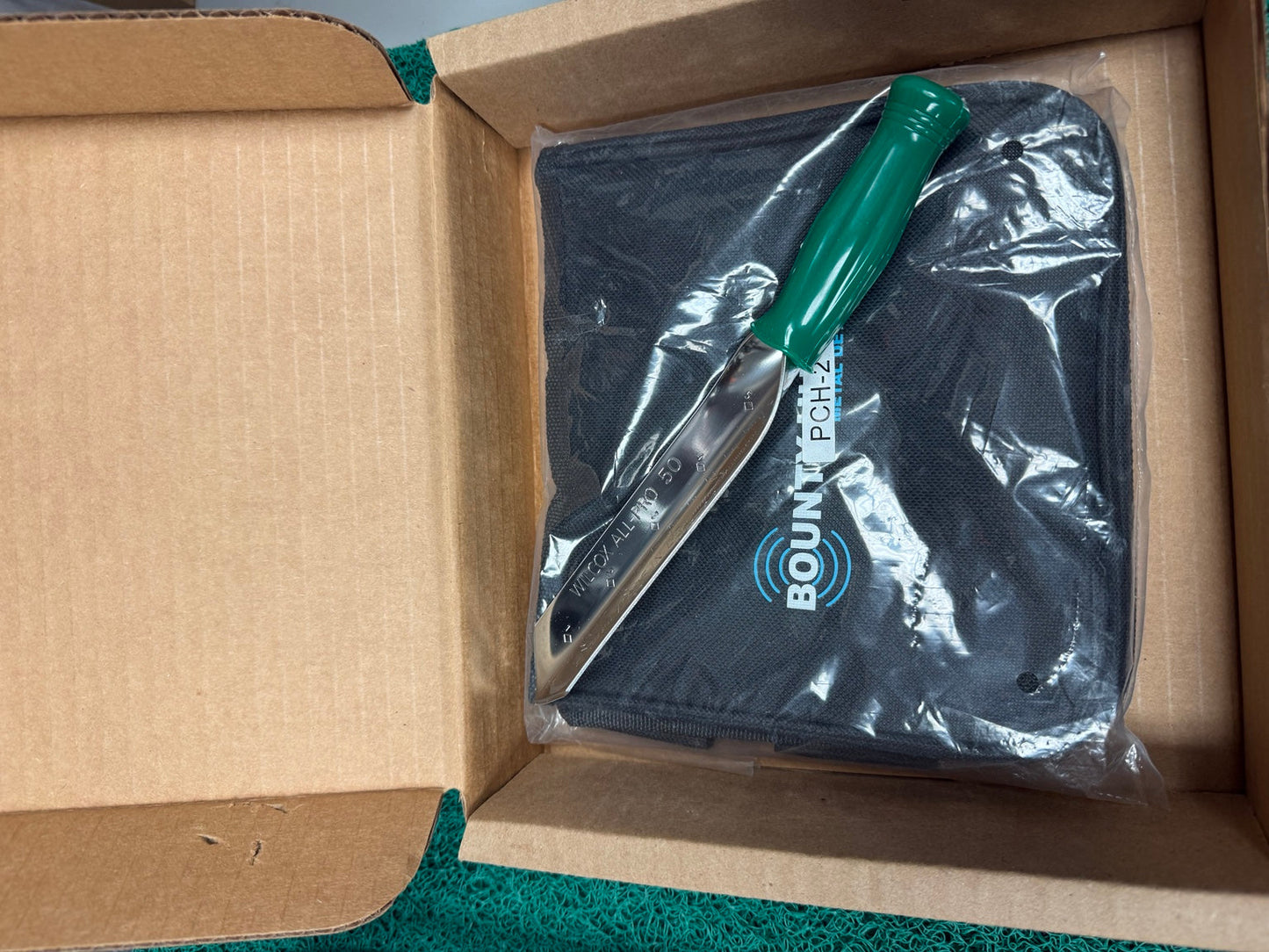 Bounty Hunter finds pouch with Wilcox All-Pro 50 stainless digging tool