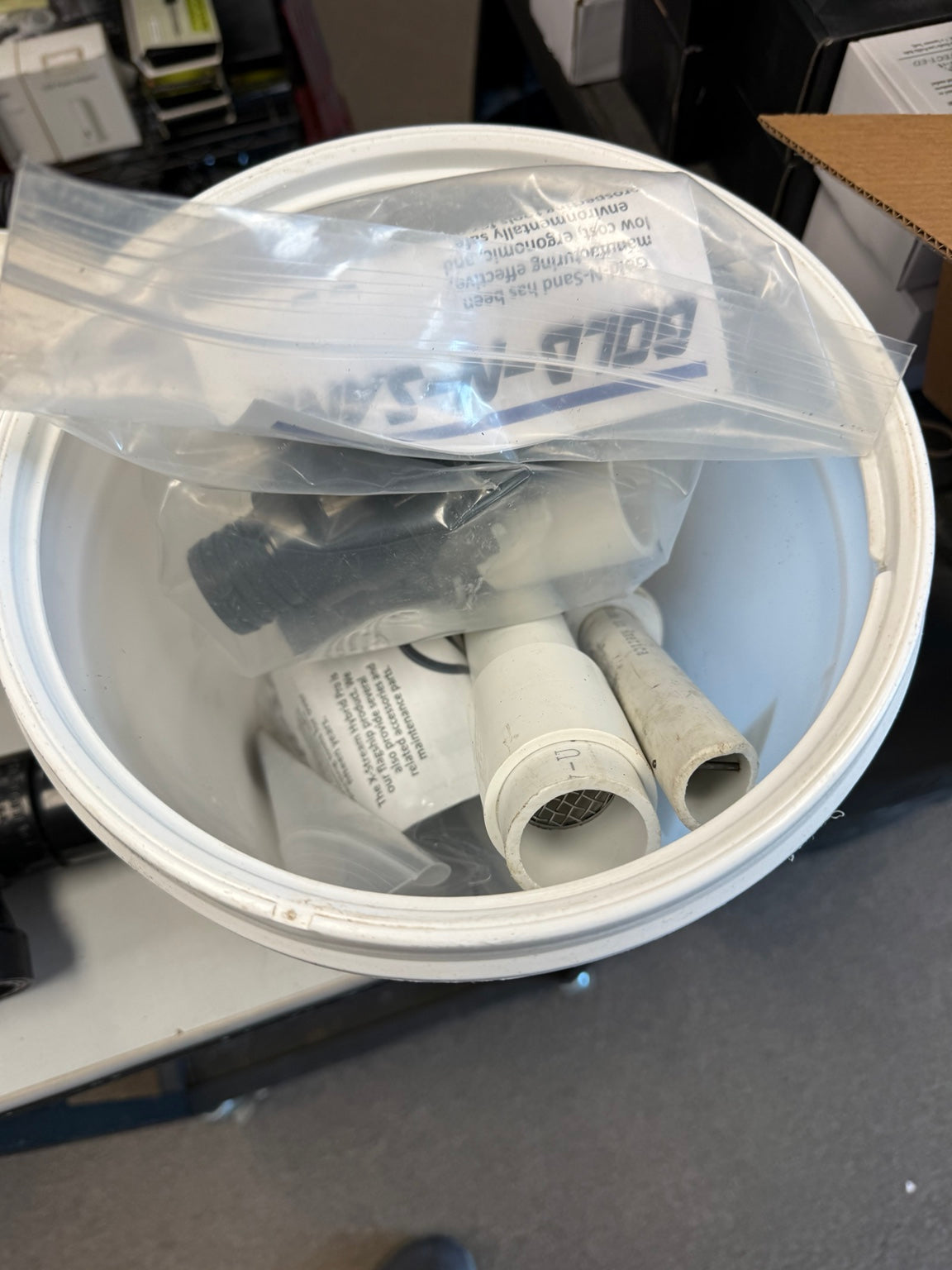 Gold-N-Sand prospecting kit components inside bucket