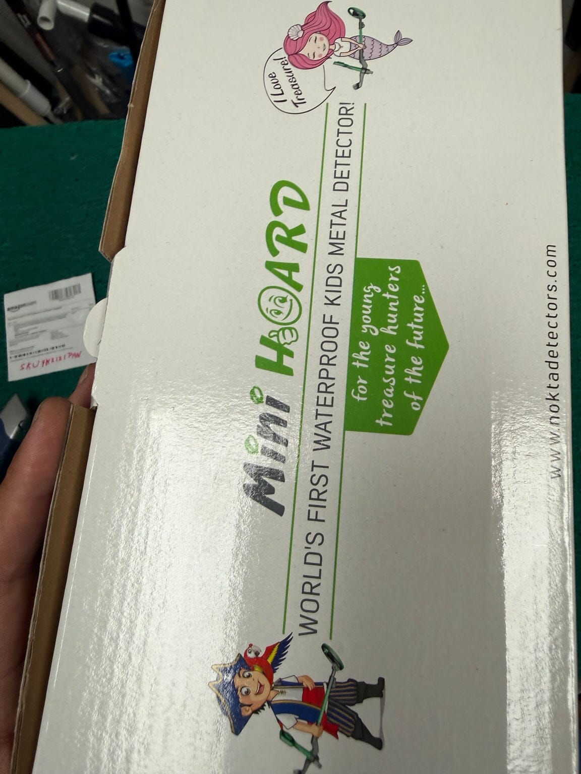 Side of used Nokta Mini Hoard kids metal detector box